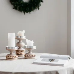 Aarikka Ruustinna ljusstake, lackad trä