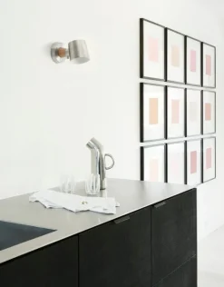 Normann Copenhagen Rise vägglampa, fast montering, rostfritt stål