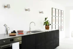 Normann Copenhagen Rise vägglampa, fast montering, rostfritt stål