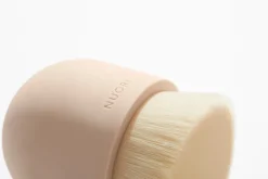 Nuori Caressing ansiktsborste, rosenröd