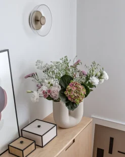 Nuura Blossi vägg-/taklampa, Nordic gold - klar