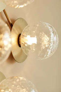 Nuura Liila 12 vägg-/taklampa, guld - klar