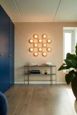 Nuura Liila 12 vägg-/taklampa, guld - klar