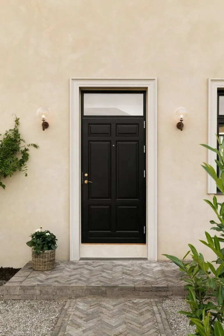 Nuura Miira Outdoor vägglampa, mörk brons - optic clear