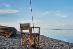 Skargaarden Kryss lounge stol, teak - beige Sunbrella Heritage